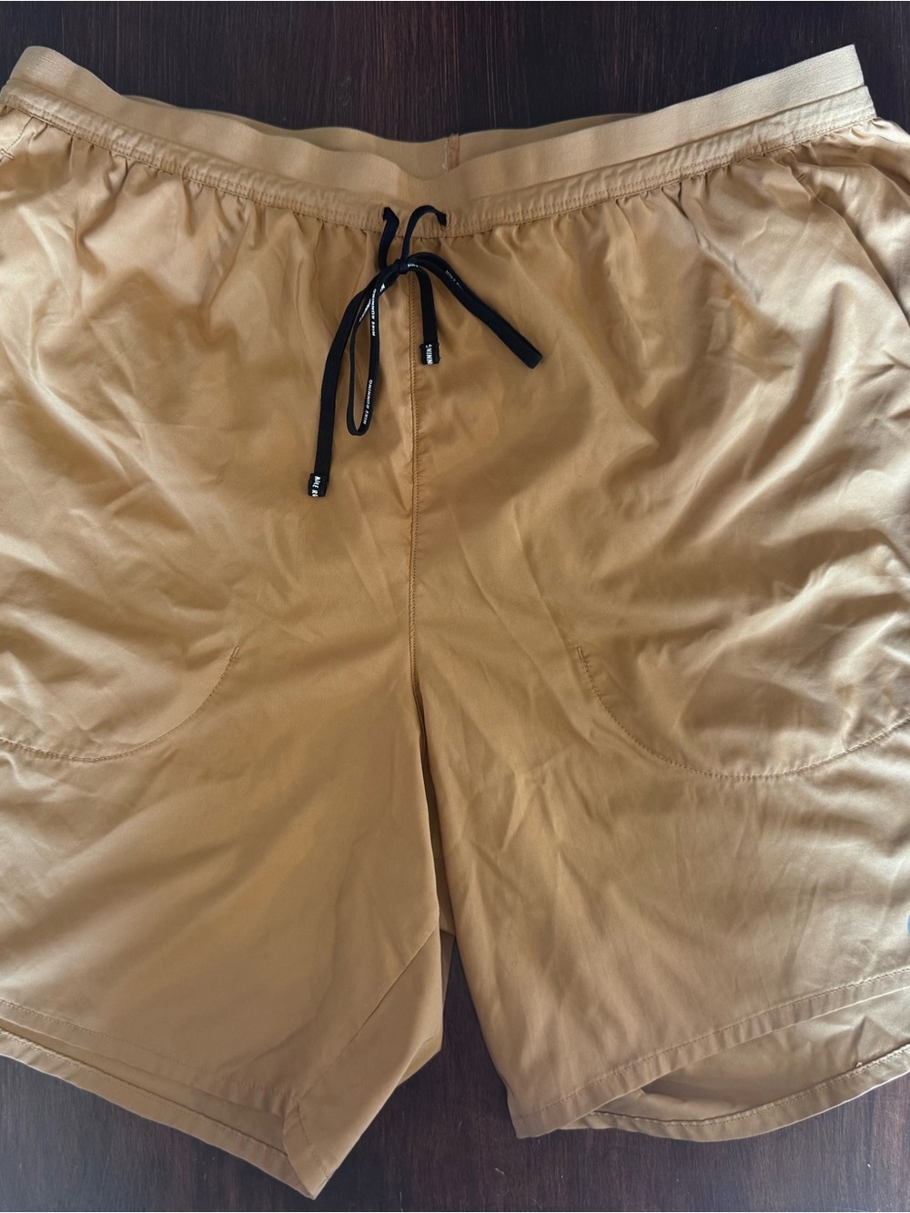 Nike Dri-FIT Beige Performance Top with Black Logo
